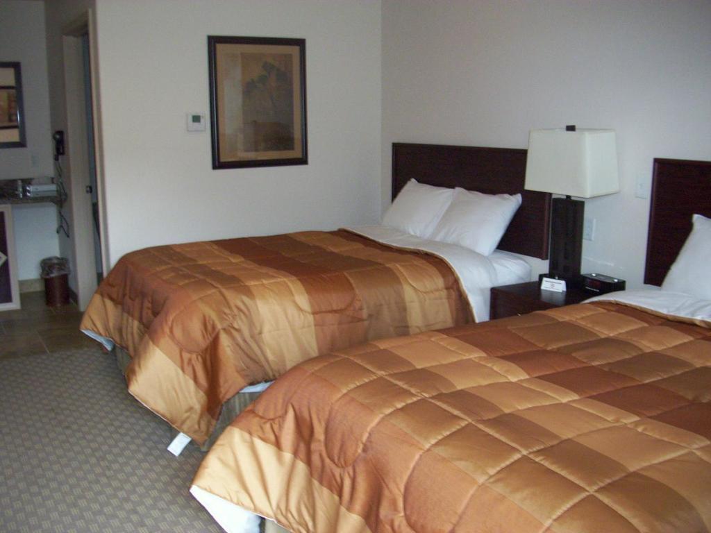 Price Pointe Inn Уокешо Экстерьер фото
