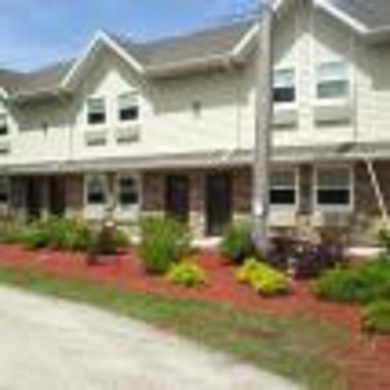 Price Pointe Inn Уокешо Экстерьер фото